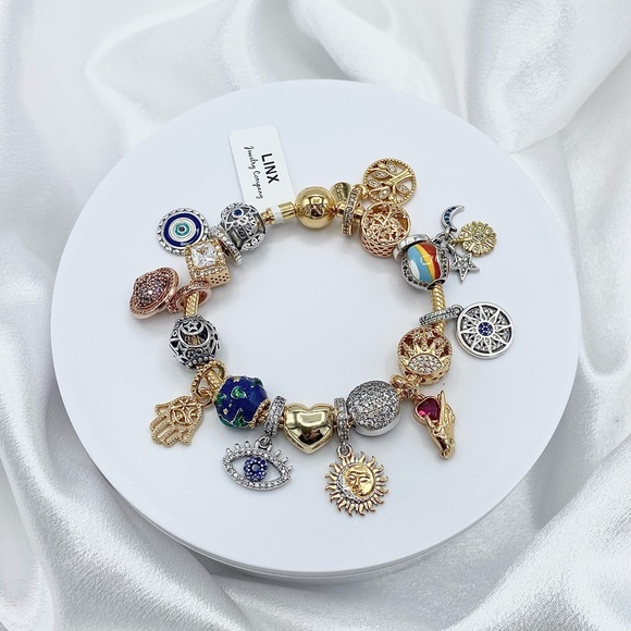 Linx Yellow Gold Snake Chain Bracelet with Universe Hamsa and Evil Eye Charms